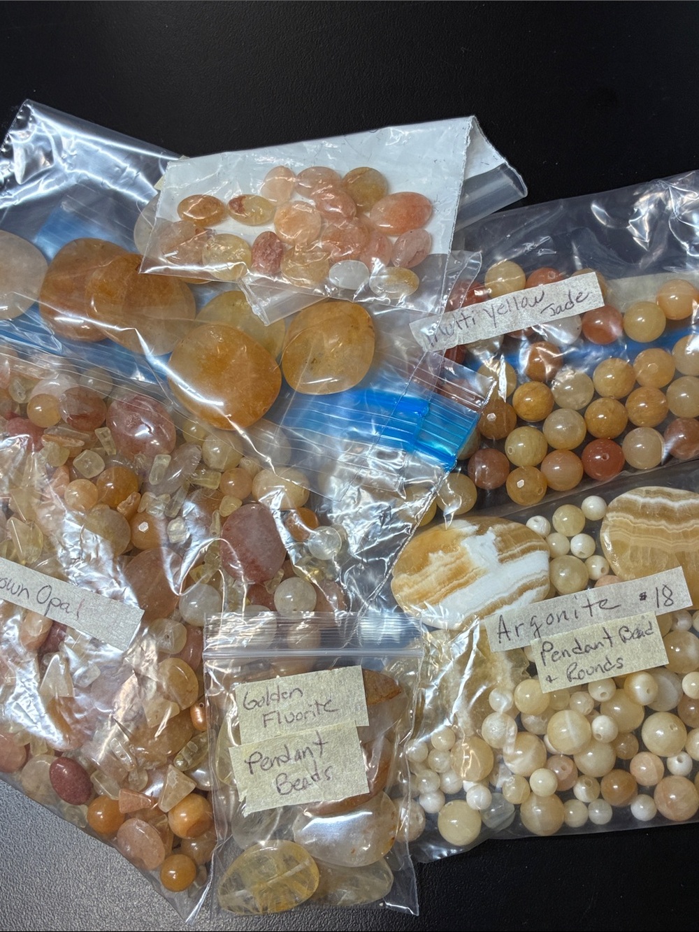 Assorted Golden Yellow Gemstone Beads and Pendants